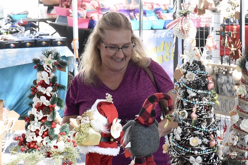 Annette Hayden browses Christmas decorations.