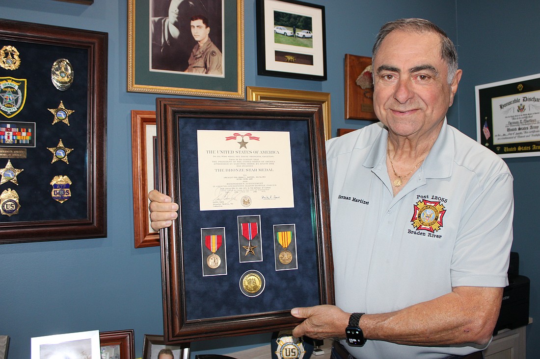 Lakewood Ranch's Herman Martinez shows off medals he earned with the U.S. Army while serving in Vietnam. Martinez said if asked to serve today, he would go.