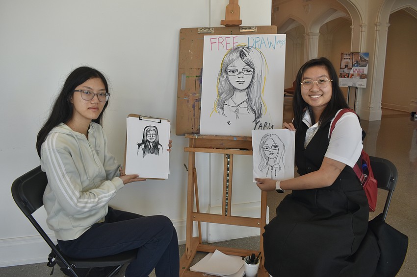 Pine View School seniors Yaru Cao and Julia Zhao offered free drawings.