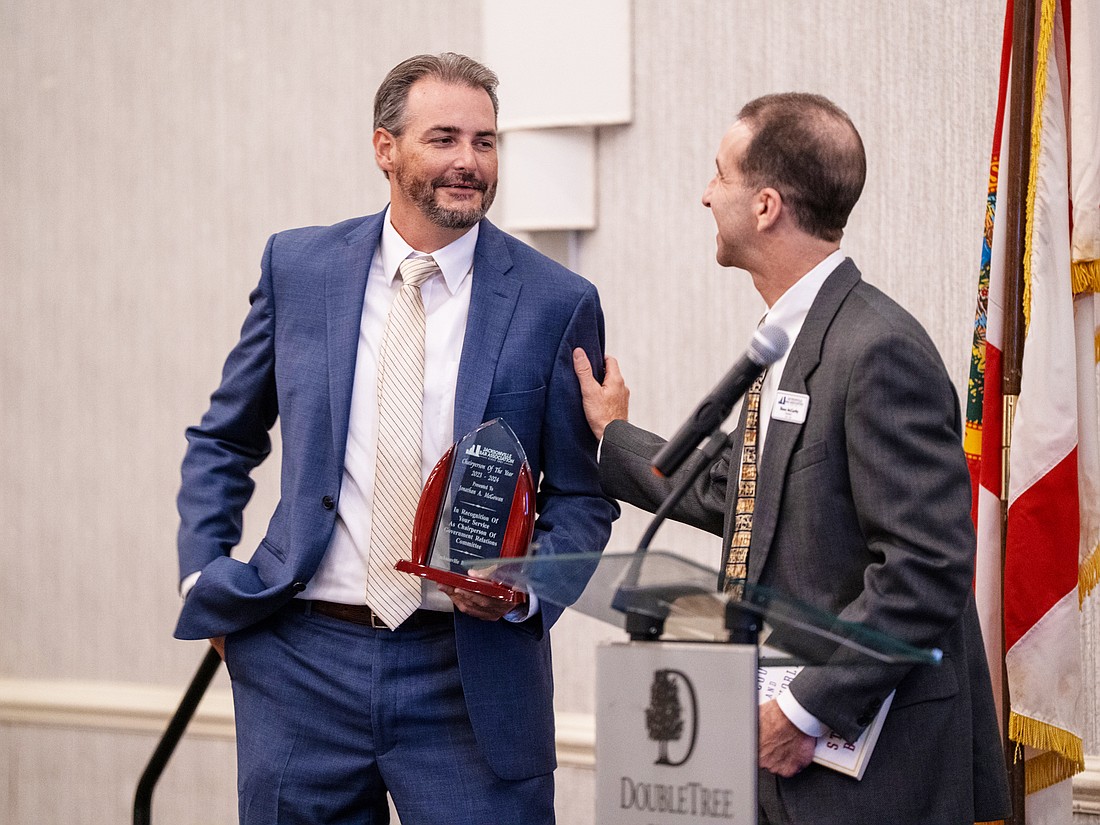 Jon McGowan, left, accepted the JBA Committee Chair of the Year Award from 2023-24 JBA President Blane McCarthy.