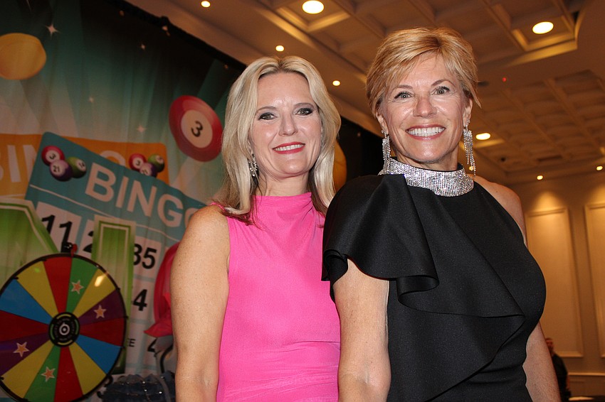 Celebrity Bingo caller Summer Smith-Pope gets together with Sisterhood for Good founder Angela Massaro-Fain before the Designer Bag Bingo numbers start being called.