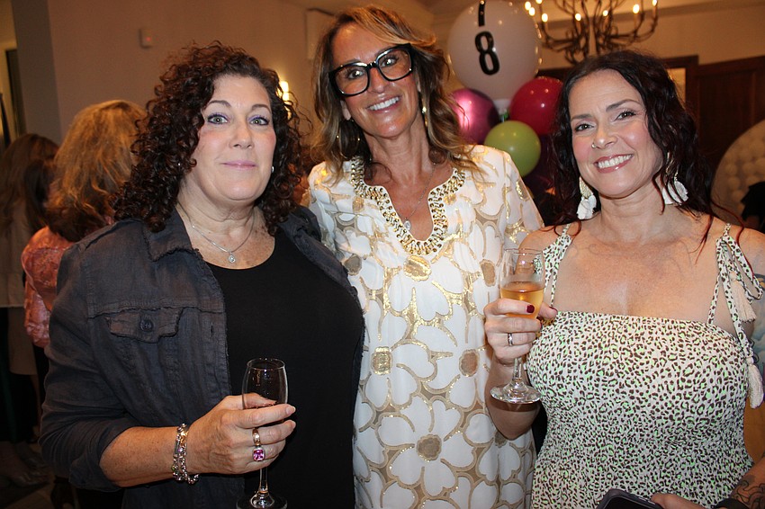 Ally Ritchko, Samina Morrow and Shannon Haider enjoy some champagne before Designer Bag Bingo gets rolling.