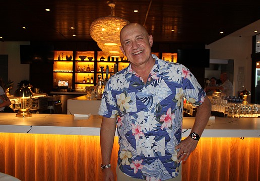 Tommy Bahama CEO Doug Wood said he is thrilled with how the rebuilding of the restaurant and retail space at 465 John Ringling Blvd. turned out, especially the indoor bar area.