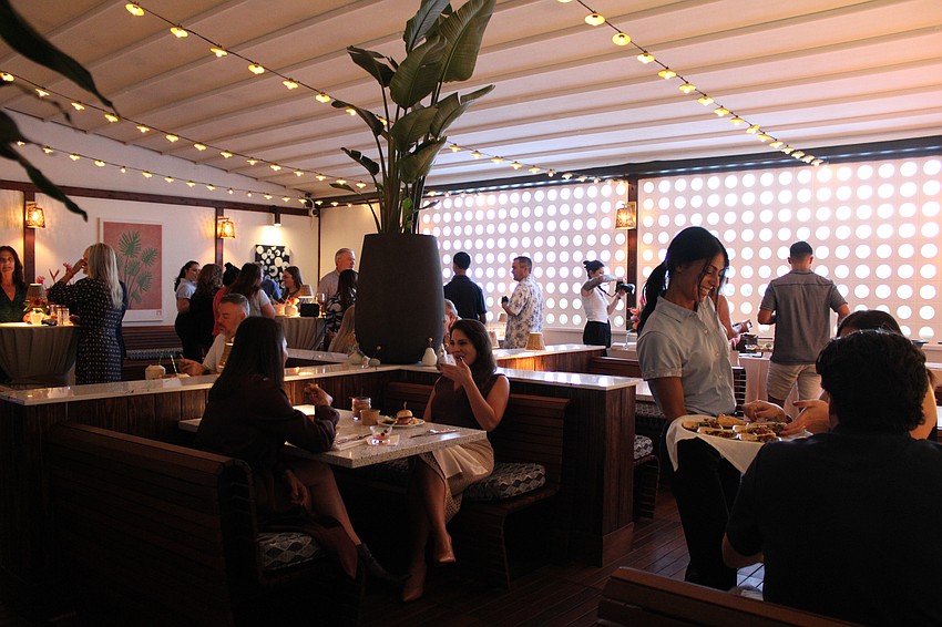 The back patio at the recently reopened Tommy Bahama Restaurant & Bar on St. Armands Key features a retractable roof.