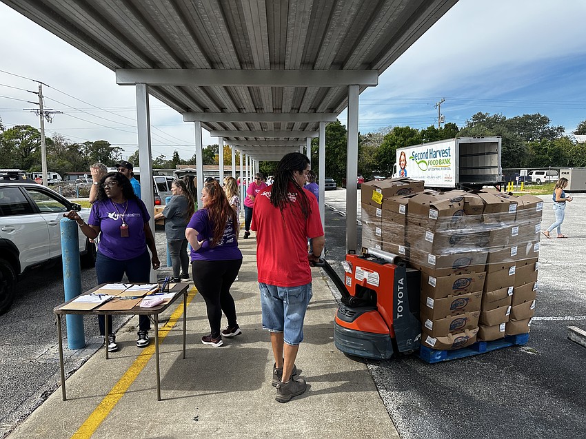 Volunteers station boxes of food. Courtesy photo