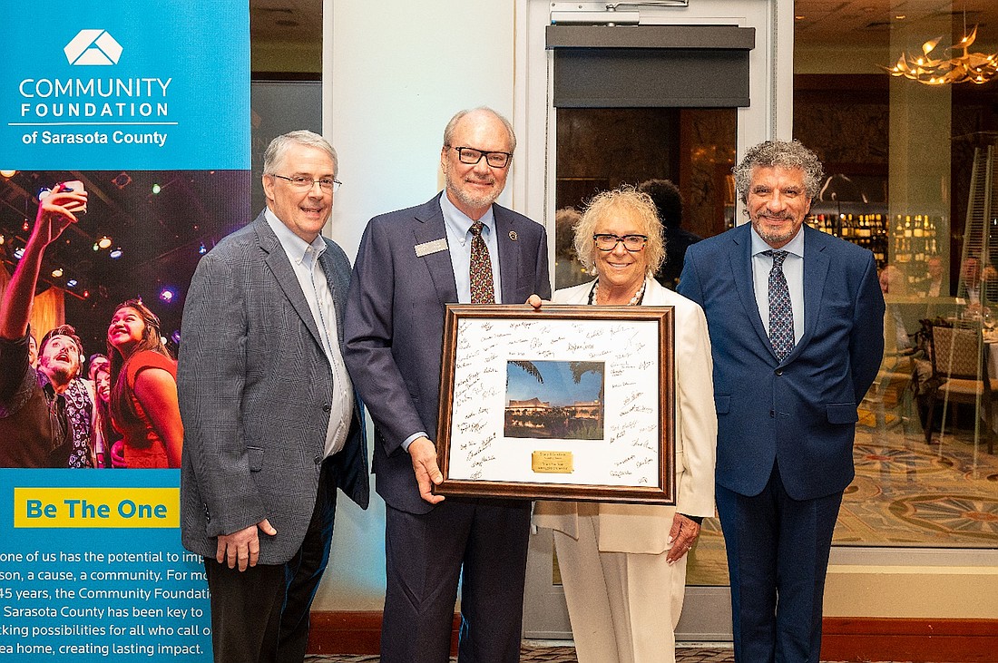 Tom and Sherry Koski (center) were recognized for their $5 million investment in Sarasota Orchestra’s, Music Center during the concert season’s first Masterworks Dinner. Also pictured are Orchestra President and CEO Joe McKenna (left) and Music Director Giancarlo Guerrero.