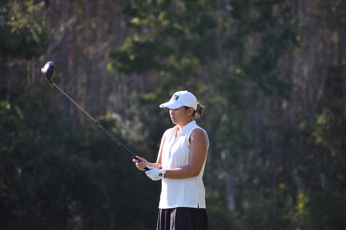 Taryn Nguyen gets ready to tee off at Heritage Isles Golf and Country Club on Nov. 5 in the regional tournament. She tied for 12th, which qualified her for a fourth-straight state tournament berth.