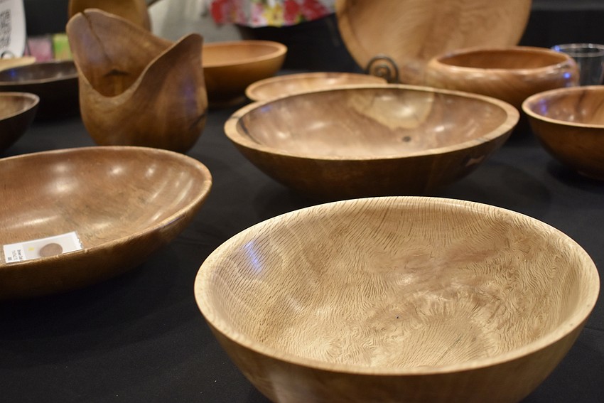 The wood takes about a year to dry before it can be carved into a bowl.