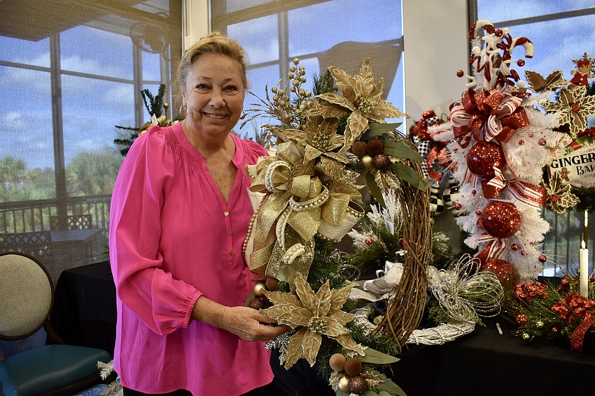 Waterlefe's Jeri Lambdin sells handmade wreaths at the art show.