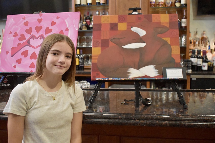 Haile Middle School's Aniston Brockway-Macek displays her artwork at the Manatee River Artists Guild at Waterlefe Art and Craft Show and Sale Nov. 8.