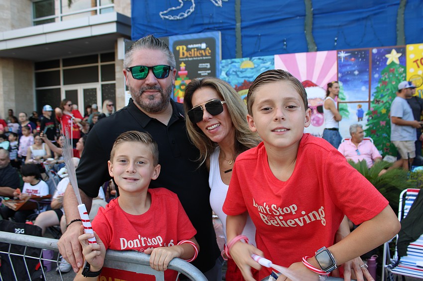 James and Sabrina Thompson brought their boys Jack, 8, and James, 11, early so they would get a good spot for watch the Santa's Grand Arrival Parade.