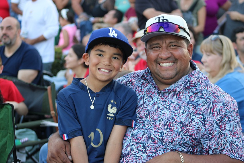 Sarasota 9-year-old Gavin Hernandez and Ruben Hernandez arrived on the parade route at 3 p.m. to get the perfect seats.