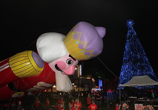 A giant helium-filled nutcracker takes a bow during the 2025 Santa's Grand Arrival Parade Nov. 8 at University Town Center in Sarasota.