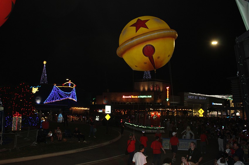 The 2025 Santa's Grand Arrival Parade featured huge helium balloons that were towed along the parade route.