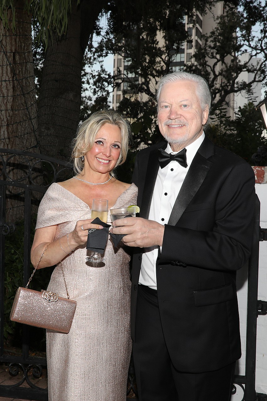 Co-chair Kimberly Tude Thout and Greg Benedict arrive at the SPARCCle Sunset Soiree.