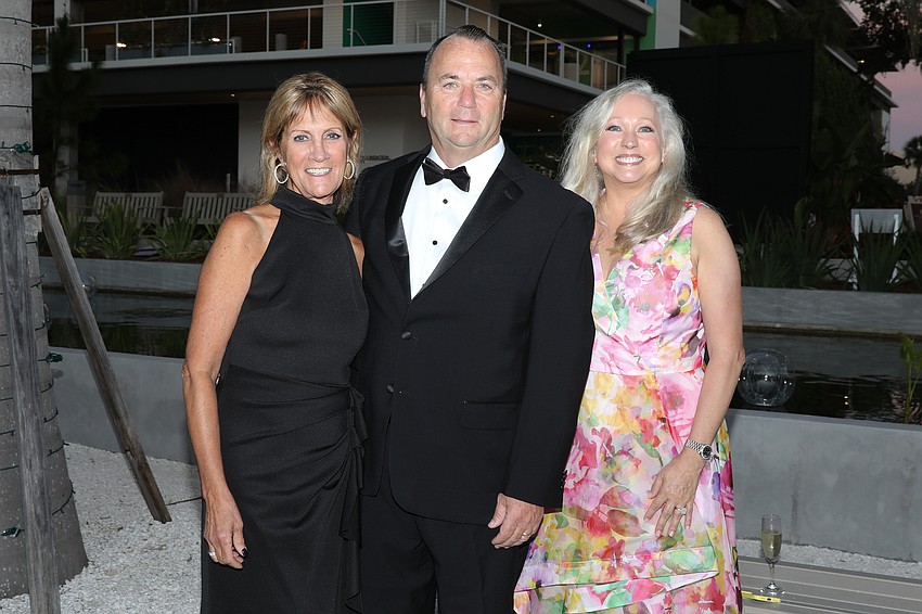 Jamie and Mike Burwell with Christeena Calkins