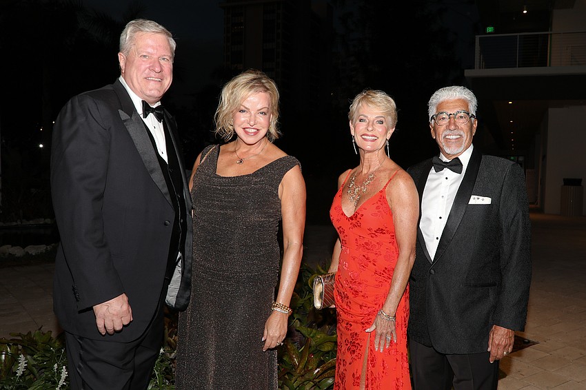 A dashing foursome include Blake and Jennifer Rolley and Charlotte Stewart and Carl Troiano.
