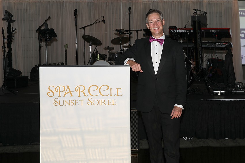 Noted for his specialty hosting fundraising auctions is SPARCCle's repeat auctioneer Joe Girvan.