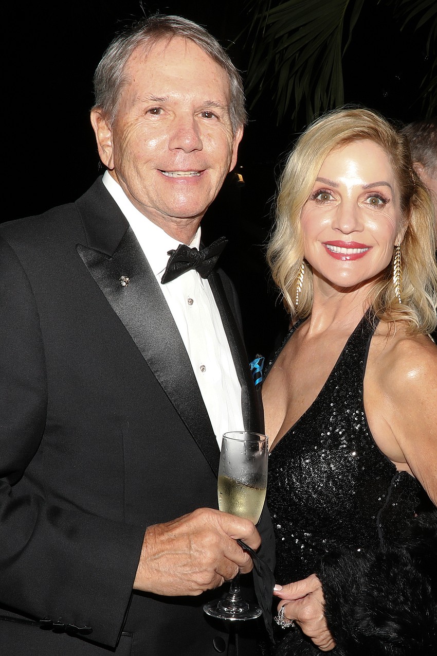 Bill Buckingham arrives with Jodi Eliason.