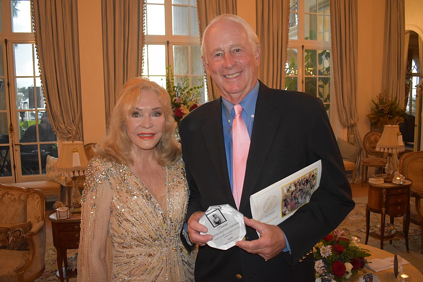 Co-chair Margaret Wise and Art Wood, who accepted the award for Bertha Palmer