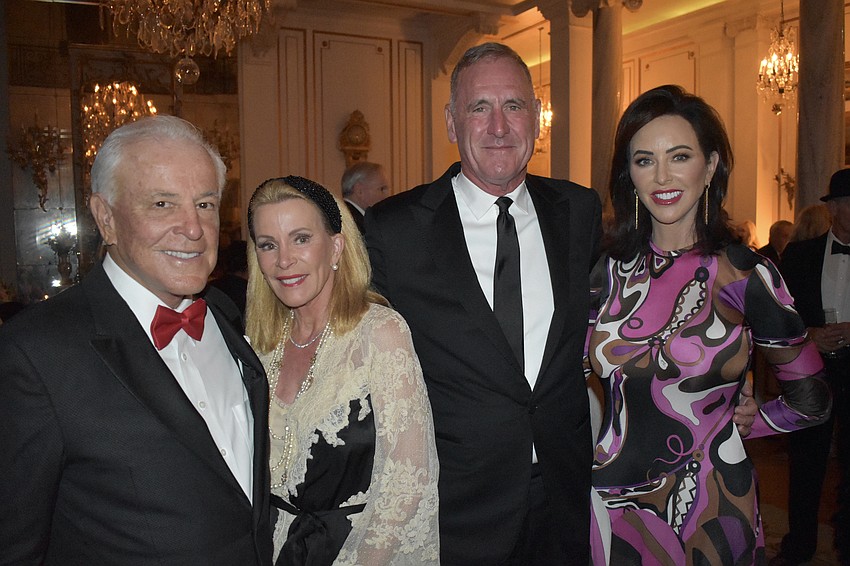 Lisa and Roy Smith, and Ted and Amy Langan