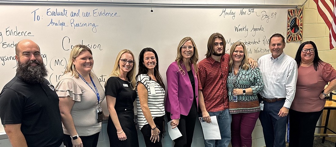 Matanzas' Ethan Tincher, fourth from left with school and district administrators, is Flagler Schools' 2026 Sunshine State Scholar. Courtesy photo