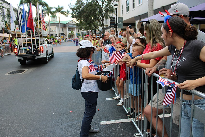 Children along the Tribute to Heroes parade route in Lakewood Ranch were rewarded with candy and other surprises.
