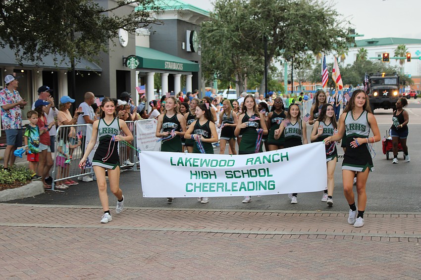 After appearing in the Santa's Grand Arrival Parade the night before, the Lakewood Ranch High cheerleaders were back again Nov. 9 in the Tribute to Heroes Parade.