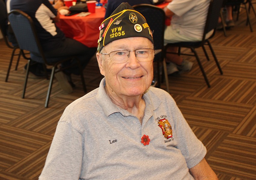 Lee Waters, who was a command pilot in the Air Force during the Vietnam War, appreciates the veterans' meal provided before the Tribute to Heroes Parade each year.