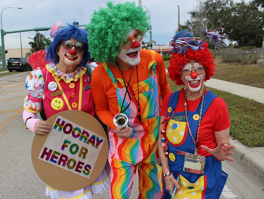 Tidewell Hospice Clowns Meredith Sweeney and John Finnegan of Lakewood Ranch and Betty Palsgrove of Palmetto provide a little comic relief during the Tribute to Heroes Parade.