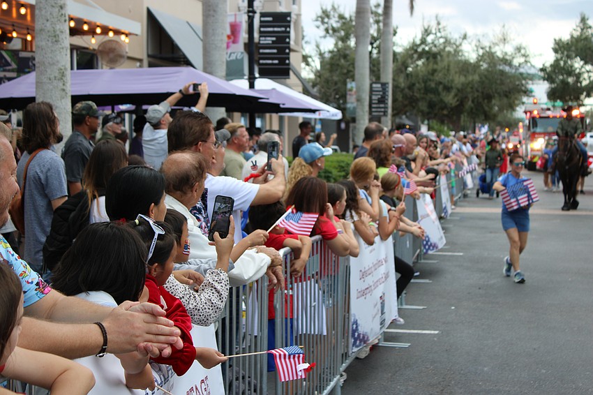 The crowd was slow to arrive at the Tribute to Heroes Parade Nov. 9 but the parade route eventually filled up down the street.