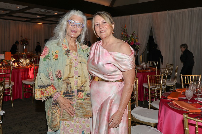 Catering manager Tracey McCammack and SPARCC's Maryellen Mancini catch up on last minute details.