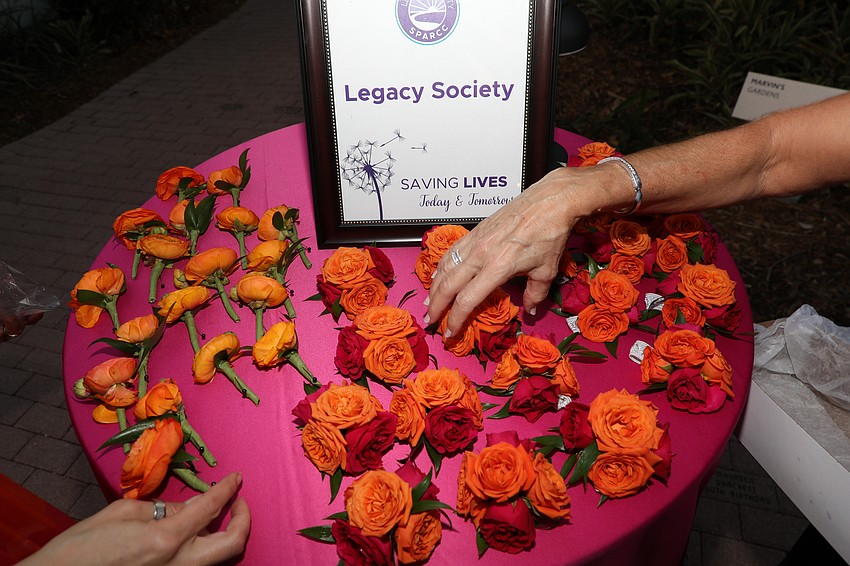 SPARCC Legacy members received wrist corsages or boutonnieres as they enter the gardens.