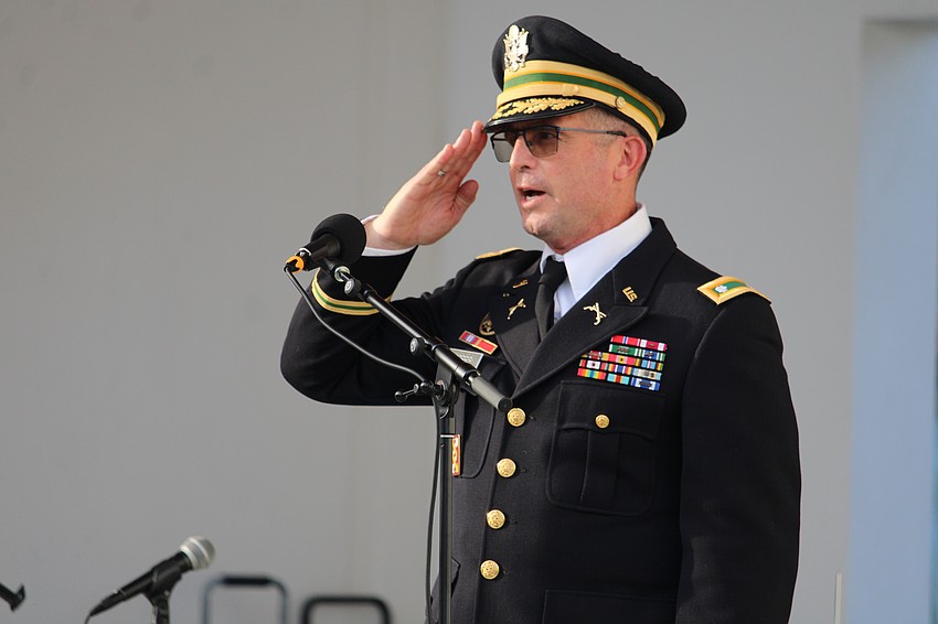 Town of Longboat Key Public Works Director and retired U.S. Army Reserve Lt. Col. Charles Mopps leads the Pledge of Allegiance and the national anthem for Veterans Day.