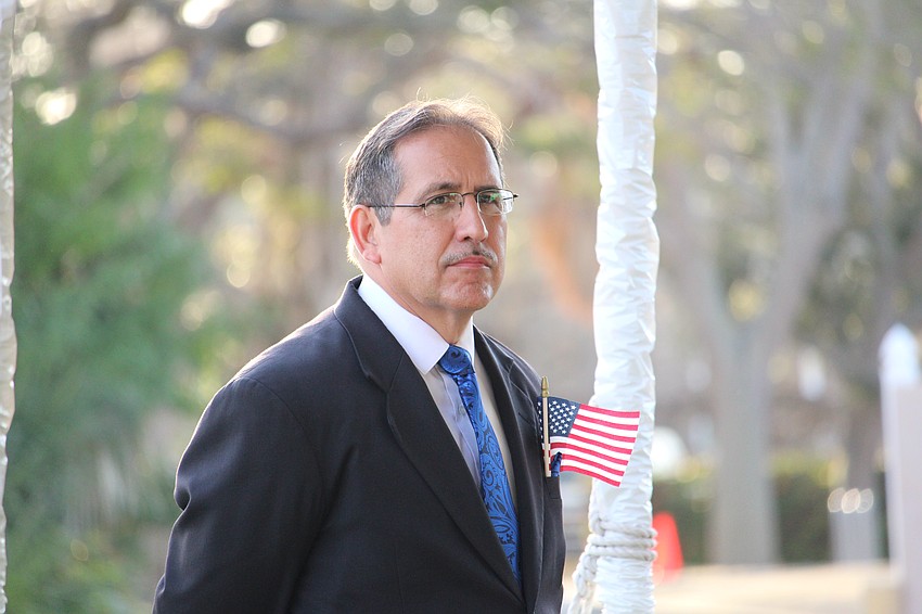 Longboat Key Assistant Town Manager Isaac Brownman shows his patriotism at the Veterans Day and town anniversary celebration.