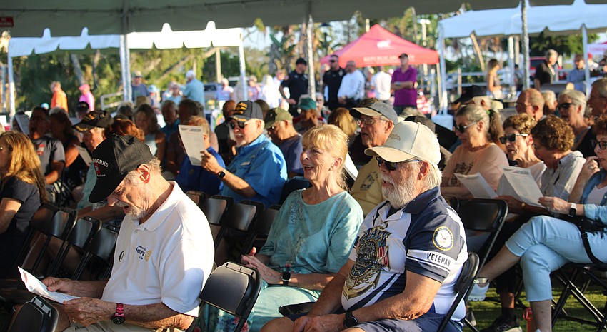 Attendees at the Nov. 8 Veterans Day and anniversary ceremony sang along with the military service songs for the U.S. Army, Navy, Marine Corps, Coast Guard, Air Force and Space Force.