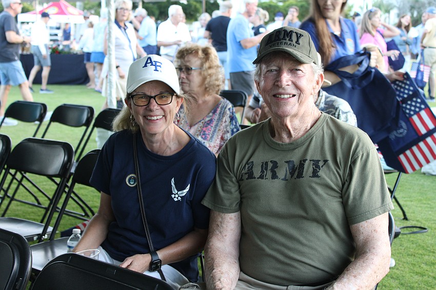 Lorri Harrison and Robert Curry join the Veterans Day event on Longboat Key.