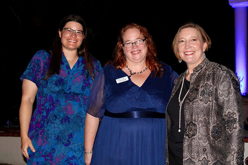 Big Water Land Trust Community Education Manager Sarah Denison Williams, Director of Philanthropy Shalla Ashworth and President Christine Johnson speak to the organization's conservation mission at Party in Paradise on Nov. 8 at the Bay Preserve on Little Sarasota Bay.