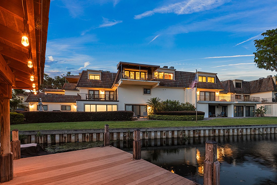 The home at 8988 Houston Place, No. 303, Orlando, sold Nov. 6, for $1,620,000. This waterfront penthouse features 180-degree vistas and two separate balconies that connect the interiors for an exceptional indoor-outdoor experience. The sellers were represented by Leslie Heimer, Premier Sotheby’s International Realty.