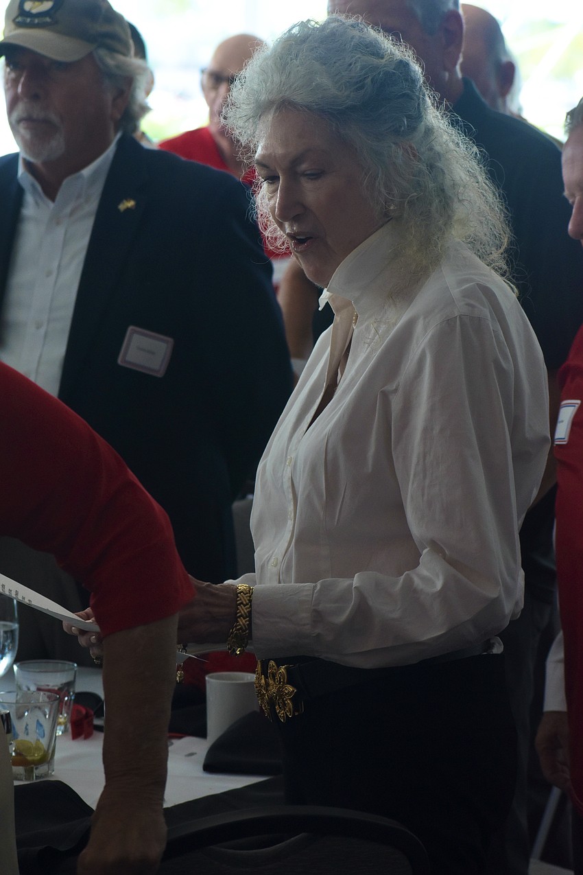 Patty Slater sings the Marines' Hymn.