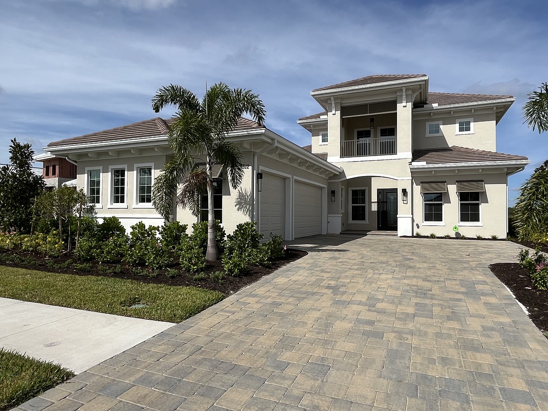 The Wild Blue at Waterside home at 8512 Sandpoint St. sold for $1.94 million. Built in 2025, it has five bedrooms, four-and-a-half baths, a pool, and 3,802 square feet of living area.