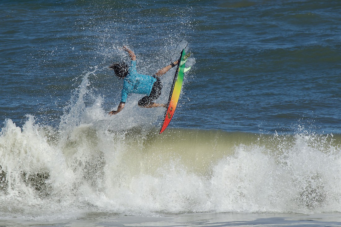 Caroline Sears surfing at a Tommy Tant competition. Photo by Robbie McCormick, courtesy of the Tommy Tant competition