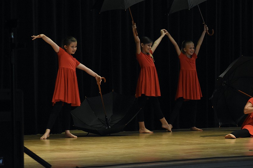 Lucy Dieterle, Ella Atkins, and Lucy Helms perform in 