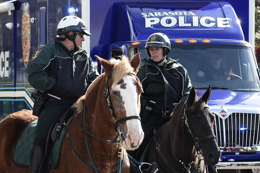 Officers with the Sarasota County Sheriff's Office lead the parade.