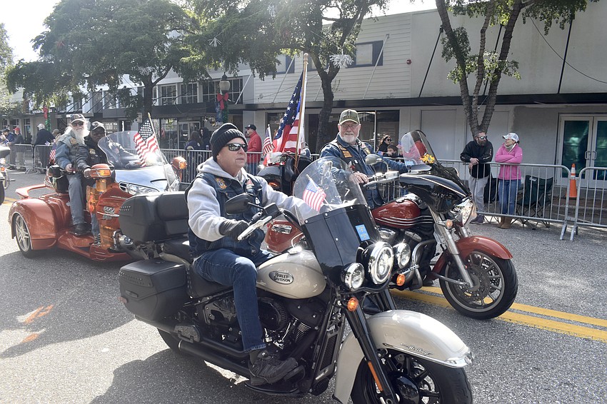 Bikers make their way along the parade route.