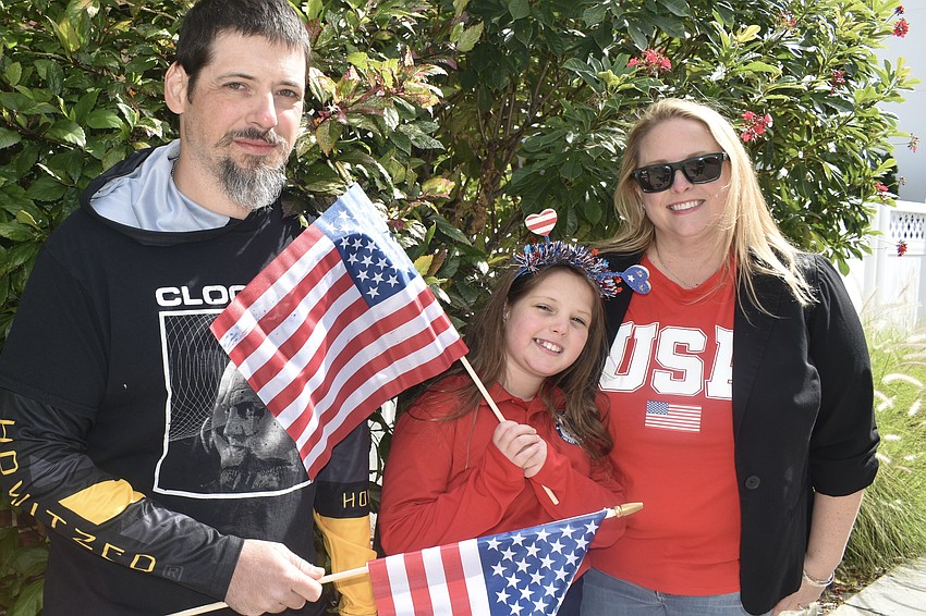 Walking with St. Mary Academy were Dylan Scheufler, Vivian Scheufler, 8, and Jade Scheufler.