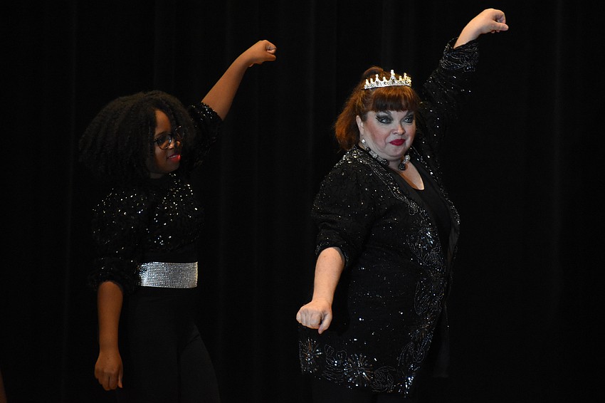 Arriyana Thomas, a freshman at Manatee School for the Arts, and instructor Kelly Burnette, participate in the school's performance of 