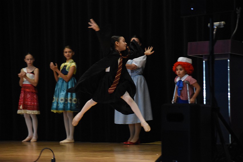 Isabella Goldhaber, 9, Finnley Adamson, 9, Ayla Duenes, 8, and Landry Murphy, 8, perform 