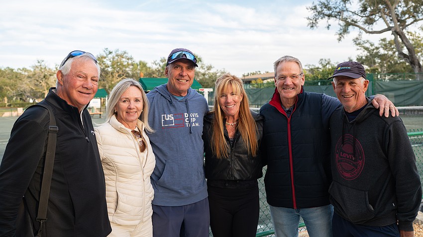Doug Rhodes, Irene Langlois, Billy Clyde Tuttle, Kate Rhodes, David Pitt and Mike Langlois pose for a picture at the Longboat Key Tennis Center Tuesday, Nov. 11 during the annual welcome back event.