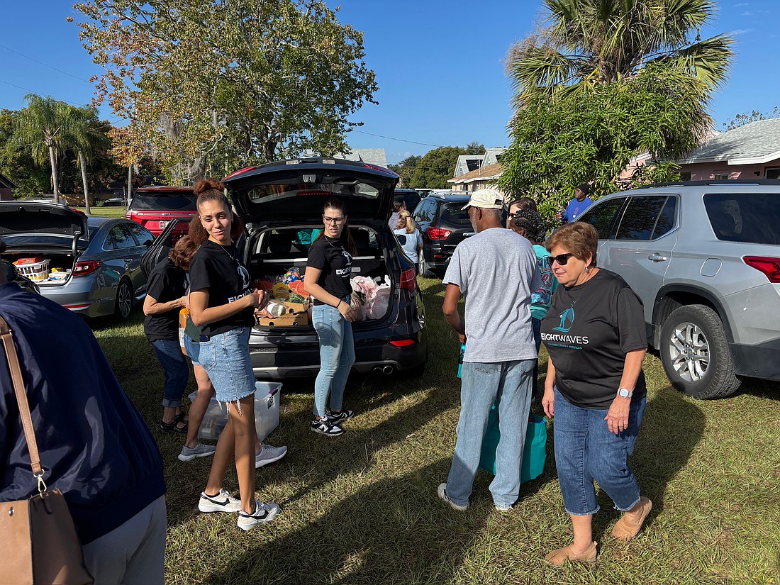 Eight Waves volunteers gathered Friday, Nov. 7, to distribute food.
